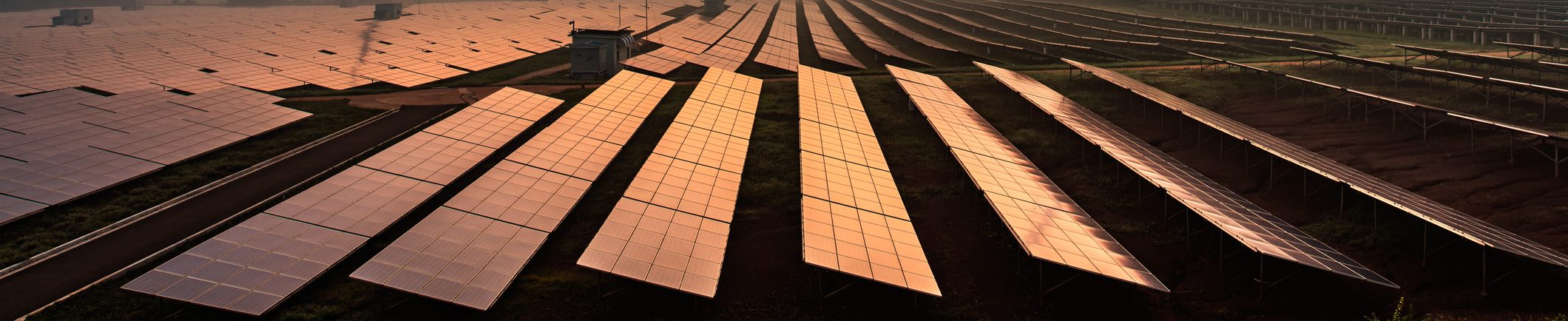 Solar power plants in the dusk of the evening
